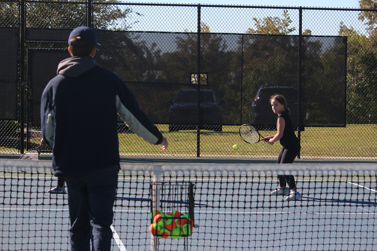 people playing tennis