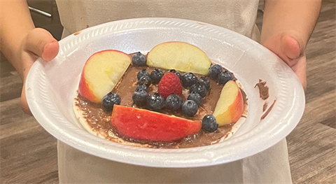 Plate with fresh fruit and berries.