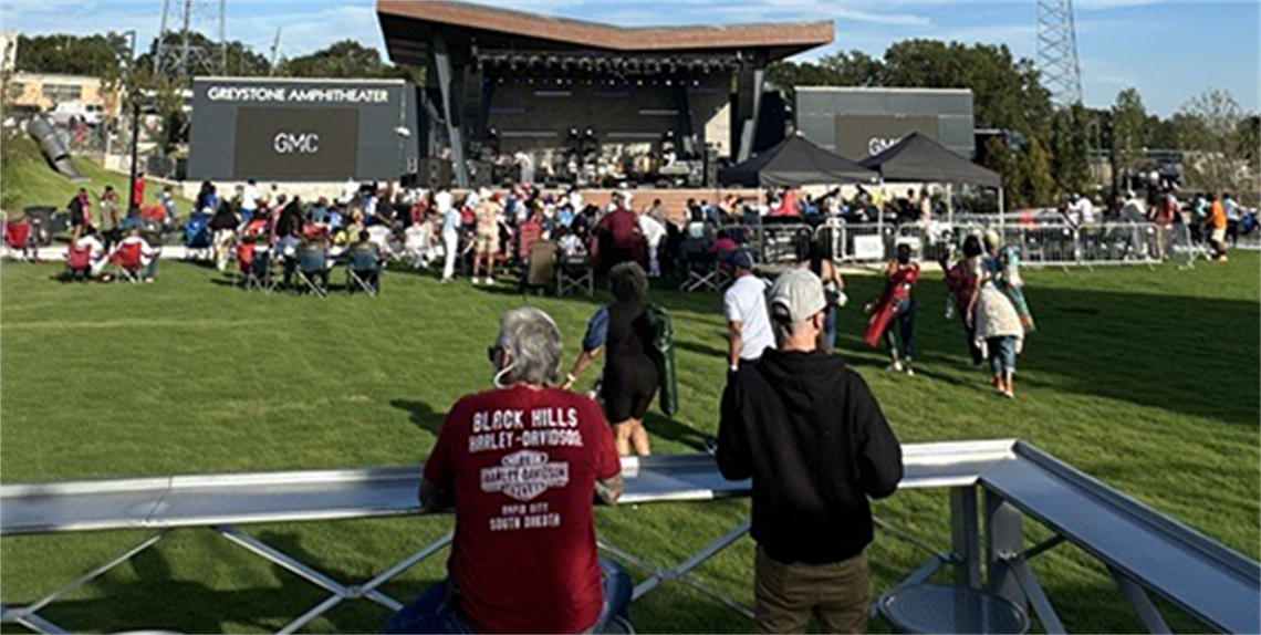 Crowd enjoying Brown Bag Lunch Concert at GreyStone Amphitheater