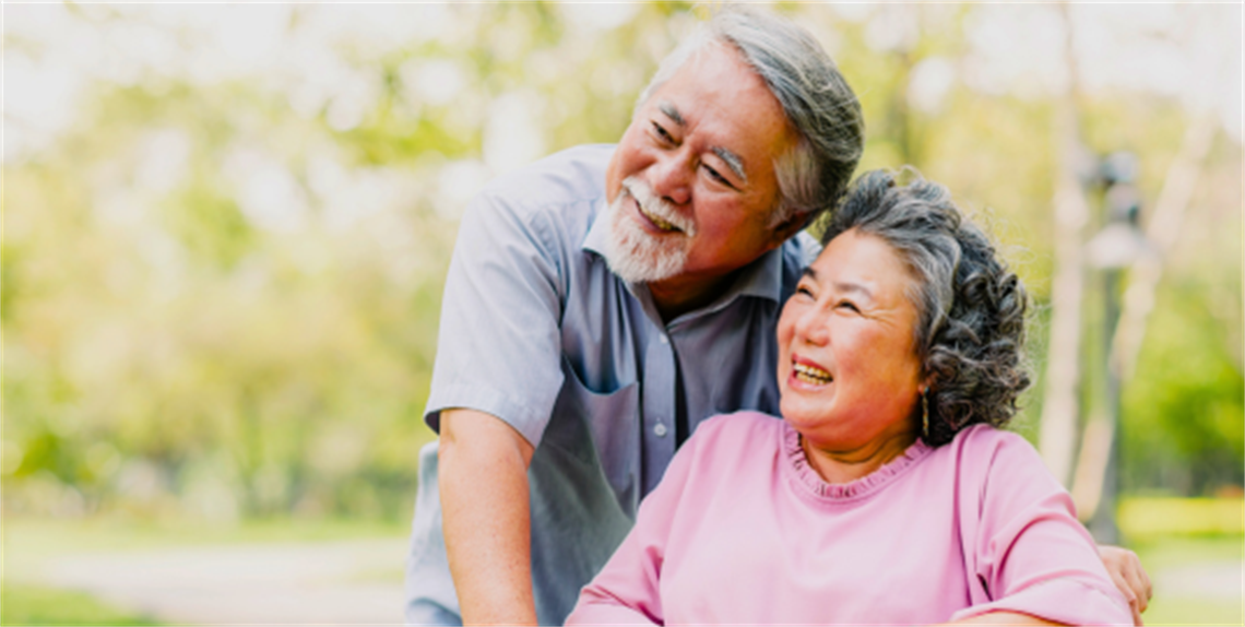 Senior Asian couple smiles