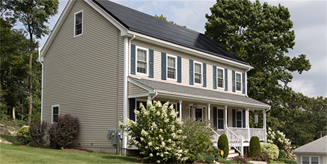 Gray 2-story house with a front porch
